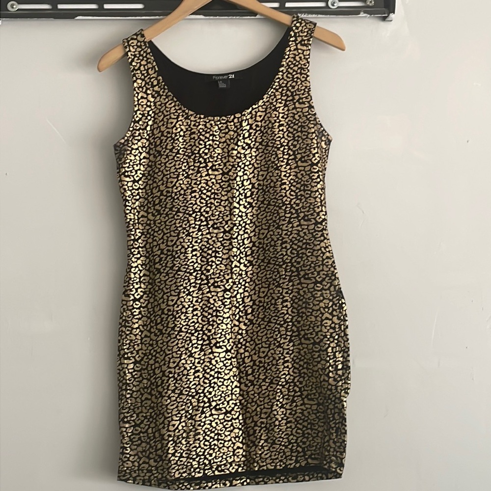 Large gold and black mini dress fits like M/L super comfortable super stretchy